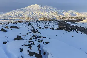 Rocks, lava field and surf at the coast