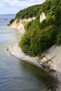 Rocky beach with the unique chalk cliffs and beech forest