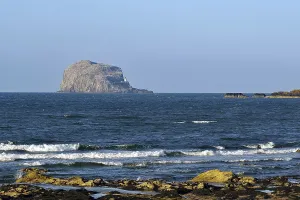 Rocky island rises from the sea