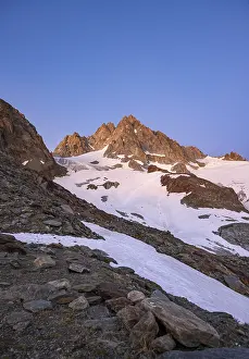Rocky mountain peak, summit of the Aiguille de Tour at sunset