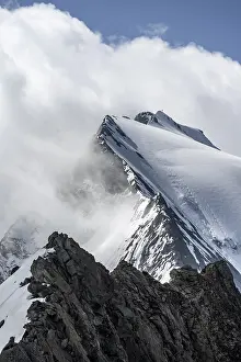 Rocky mountain ridge and glaciated mountain peak Grosser Moeseler