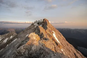 Rocky mountain ridge, summit of the Zugspitze with Zugspitze railway