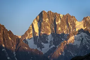 Rocky pointed mountain peaks at sunset