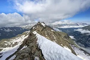 Rocky summit with snow, summit of the Schoenbichler Horn