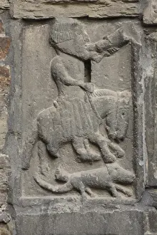 Romanesque rectory gate, relief, St. Saint, Saint