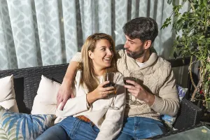 Romantic couple enjoying a glass of wine together