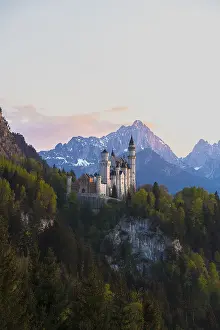 Romantic Neuschwanstein Castle in front of picturesque Alps
