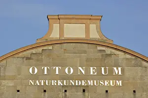 Roof with golden illuminated inscription from the baroque Ottoneum built in 1606