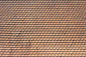 Roof with red tiles of type beaver tail Roof with red tiles of type beaver tail