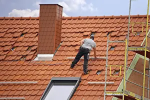 Roofing work, re-roofing of a tiled roof
