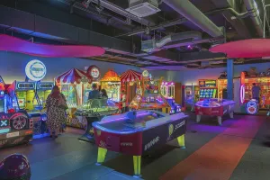 Room with electronic gaming machines and visitors