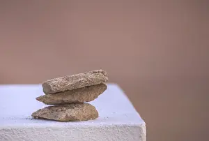 Three rough stones placed on top of each other