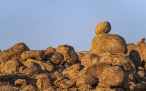 Round spherical rocks, stacked into hills
