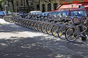 Row of bicycles from a rental system on a Parisian street