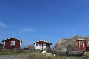 Row of colorful wooden vacation home in the middle of nature in Sweden