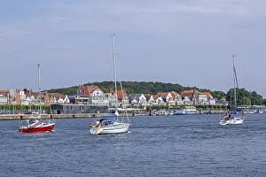 Row of houses, sailing boats, Travemunde