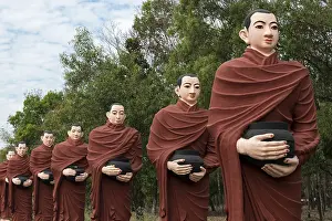 Row of statues of the 500 Arahant followers of Buddha at Win Sein Taw Ya