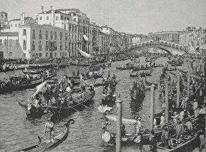 Rowing competition of the gondoliers on the Grand Canal in Venice