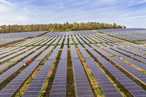 Rows of photovoltaic systems are systematically expanding in the countryside