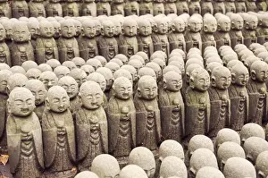 Rows of similar Japanese Jiizo sculptures