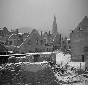 Ruins of destroyed houses in the snow