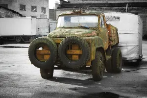 Rusry vintage car standing in the yard