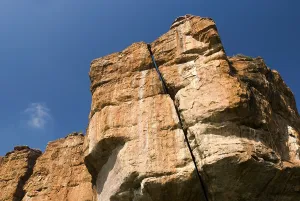 Rust red sandstone cliffs rocks in Badami