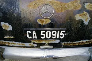 Rusty trunk of Mercedes 190, Cape Town register plate