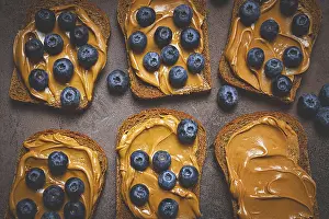 Rye bread with peanut paste and fresh blueberries