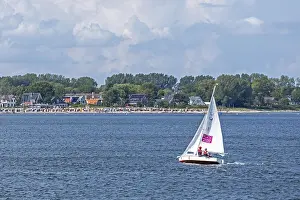 Sailboat in front of Strande, Kiel Fjord