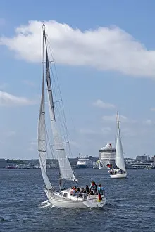Sailing boats, ferry, cruise ship AIDA nova