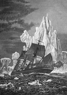 Sailing ship facing an iceberg