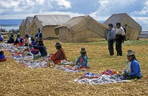 Sale of souvenirs, reed huts on a floating Uro island in Lake Titcaca