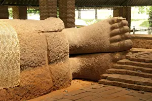 The sandstone reclining Buddha housed at Wat Dharmacakra Semaram is the oldest reclining Buddha in Thailand