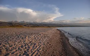 Sandy beach beach on the banks of Issyk Kul