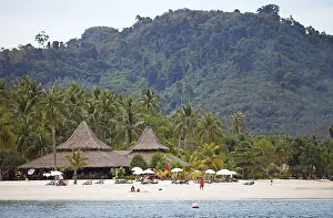 Sandy beach beach and straw huts at Sivalai Resort