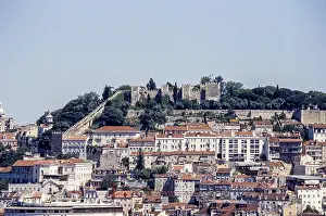 Sao Jorge Castle above the rooftops of the city