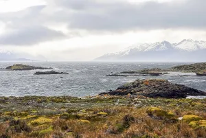 Framed Print : Scenic view of the Beagle Channel with rocky islands and snow-capped mountains Framed Print : Scenic view of the Beagle Channel with rocky islands and snow-capped mountains