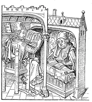 Scholars studying at reading desks