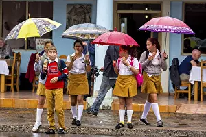School children, pupils crossing a street in Vinales