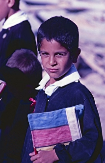 Schoolboy on his way to school