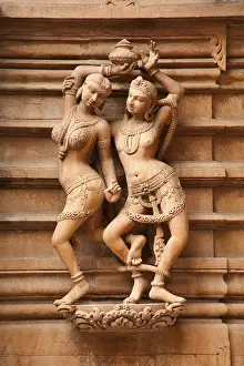 Category Historic EN Prints: Sculpture of a man and woman on the wall of panchasara parasvanath jain temple