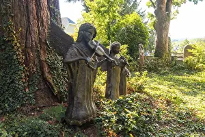 Sculptures next to the Holy Trinity Church in the medieval mountain village of Sasbachwalden