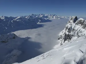 Above the sea of fog, mountains in the winter