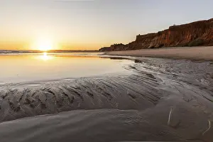 Sea with reflection at low tide in the calm waters of the Atlantic