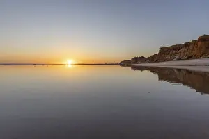 Sea with reflection at low tide in the calm waters of the Atlantic