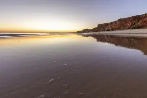 Sea with reflection at low tide in the calm waters of the Atlantic