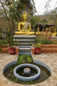 Seated Buddha Statue in Wat Phra That Doi Phra Chan in Mae Tha District Lampang Thailand