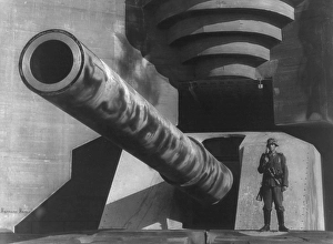 Second World War 1939-1945. barrel of a large cannon with German soldiers at fortifications, 1943. weapon armament heavy artillery sentry gun