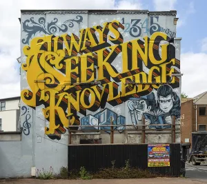 Always seeking knowledge mural artwork by Inkie